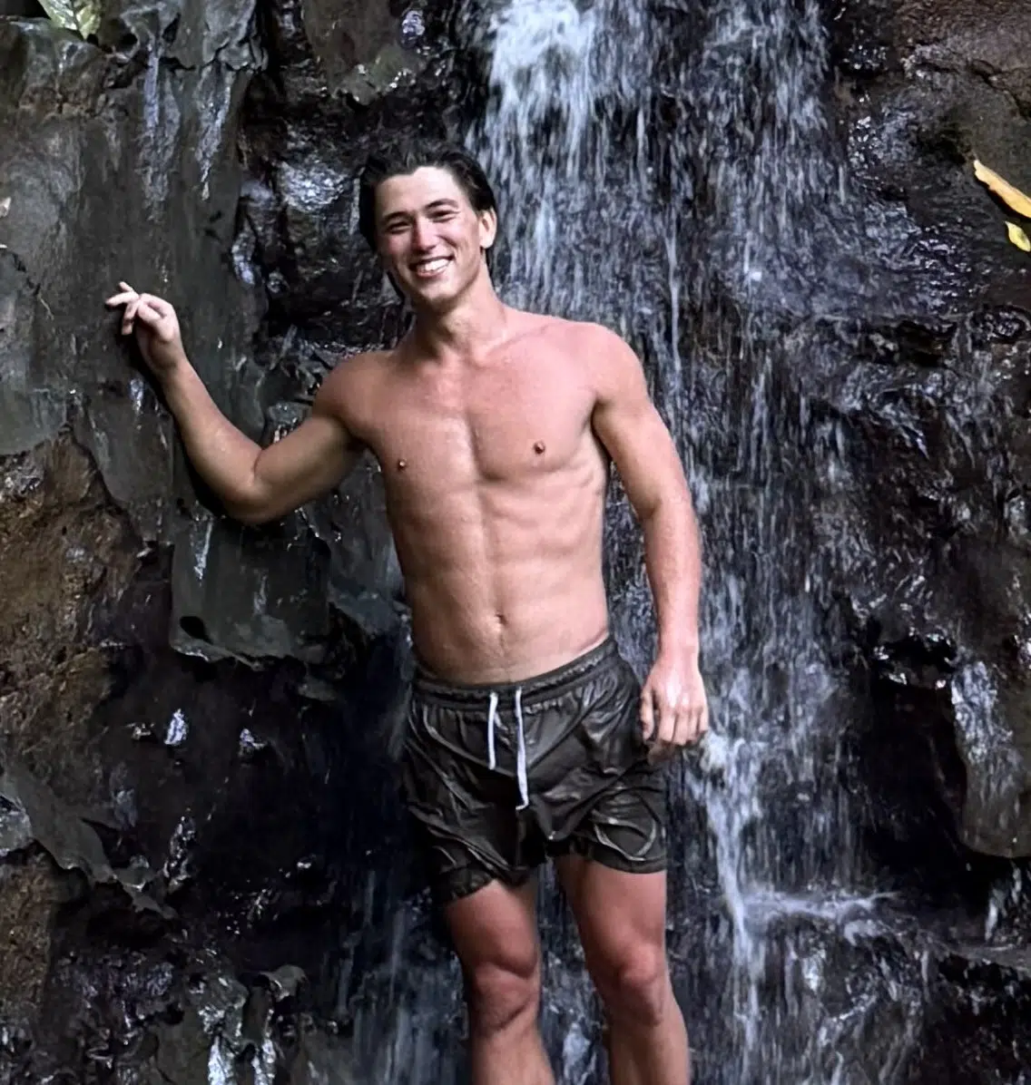 Man standing in front of mountain